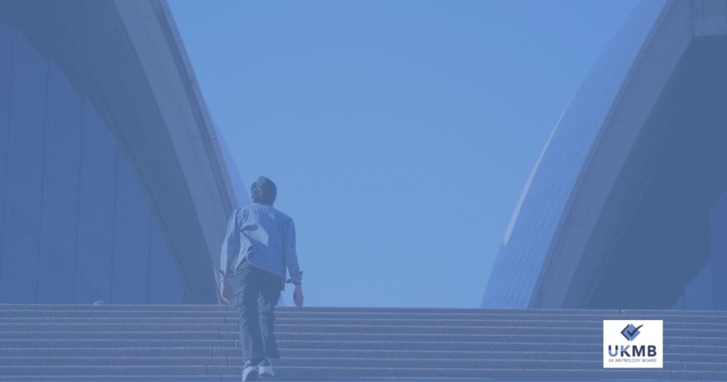 A man walking up stairs in London
