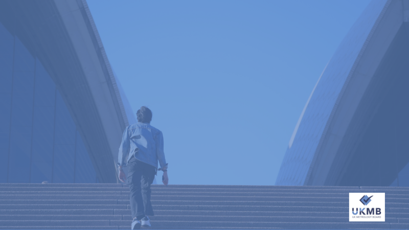 A man walking up stairs in London
