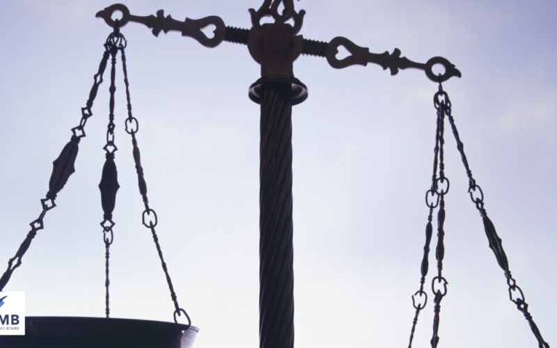 An image of some old fashioned weighing scales.